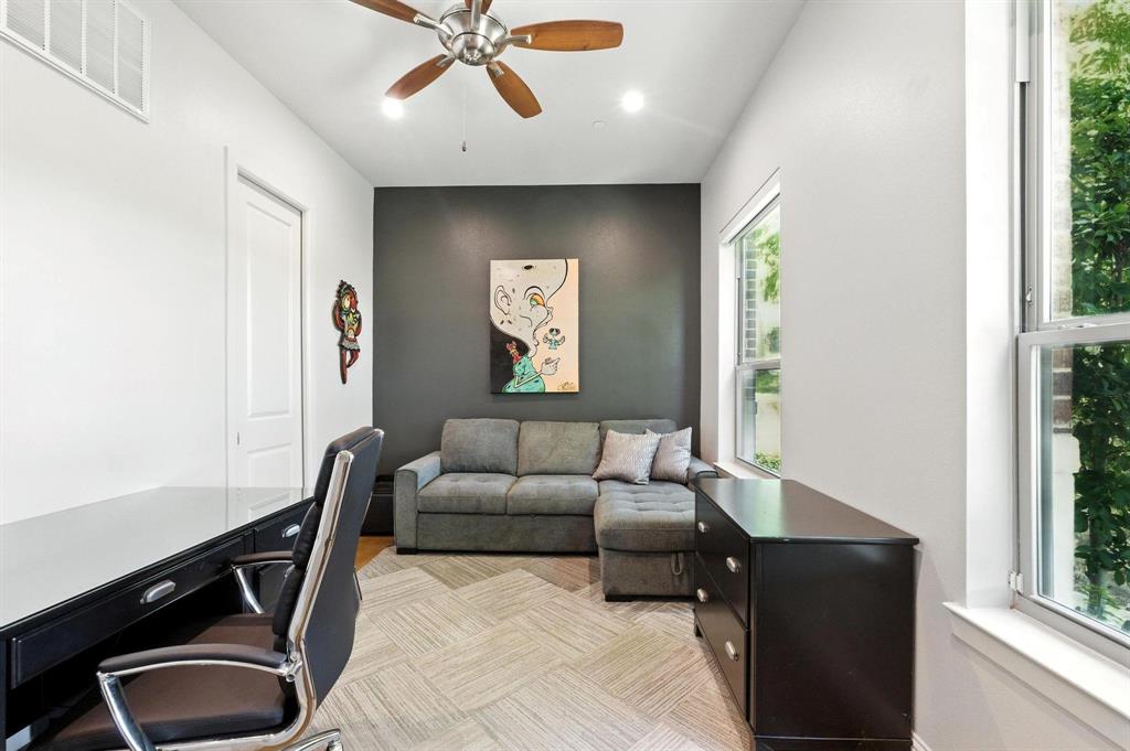 101 Decker Drive, Unit 301 Irving, TX 75062 - Photo 6 of 32 a living room with furniture and a window