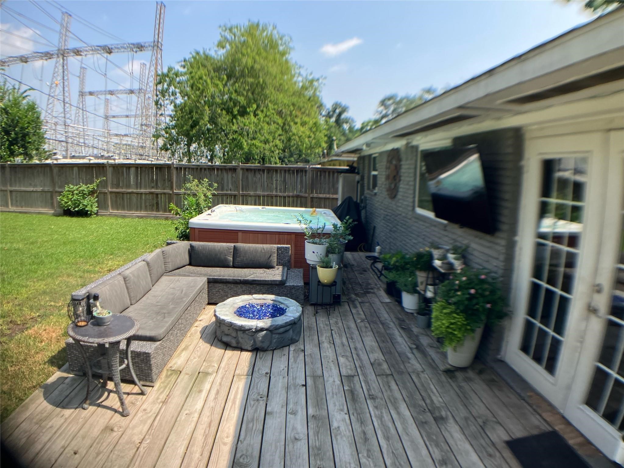 3027 Guese Road Houston, TX 77018 - Photo 22 of 22 Spacious backyard deck offers the perfect setup for outdoor entertaining, grilling, or relaxing evenings at home.