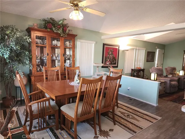 a kitchen with a sink a stove and refrigerator