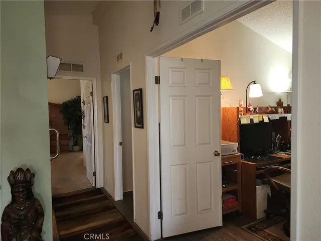 a workspace with furniture and a window