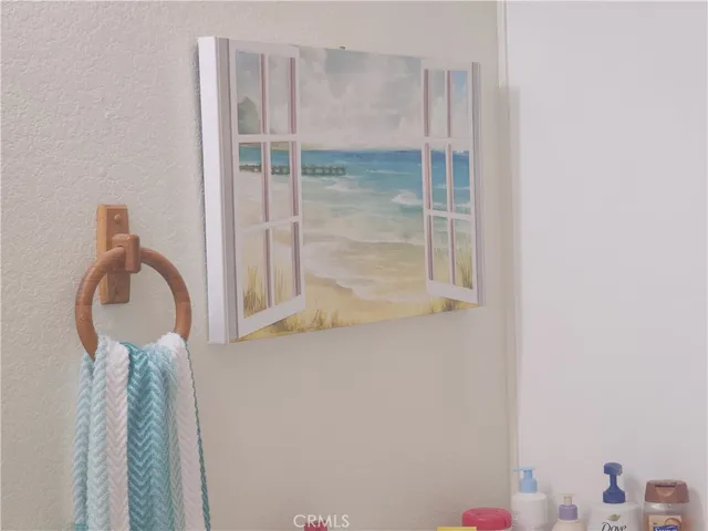 a bathroom with a shower curtain and a sink