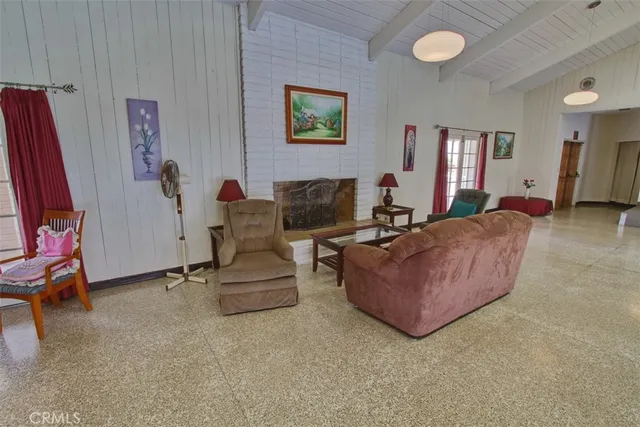 a view of a livingroom with furniture and a couch