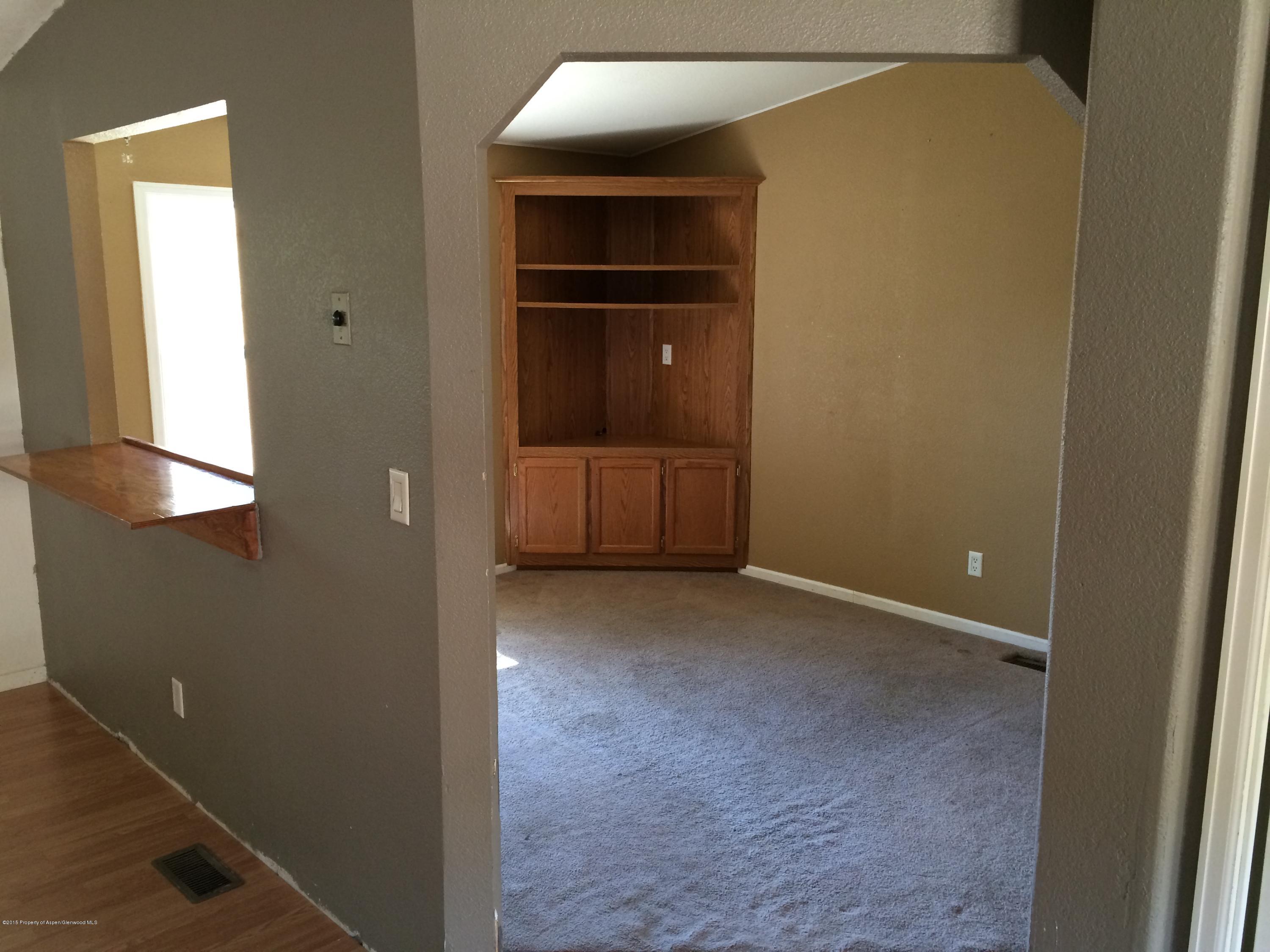 140 Ray Street Rifle, CO 81650 - Photo 7 of 11 a view of an empty room and closet