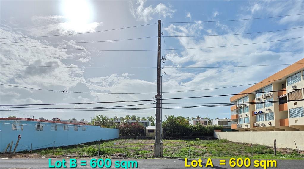 16 Ocean Drive Avenue, Unit LOTS A & B Luquillo, PR 00773 - Photo 4 of 15 a view of building with yard