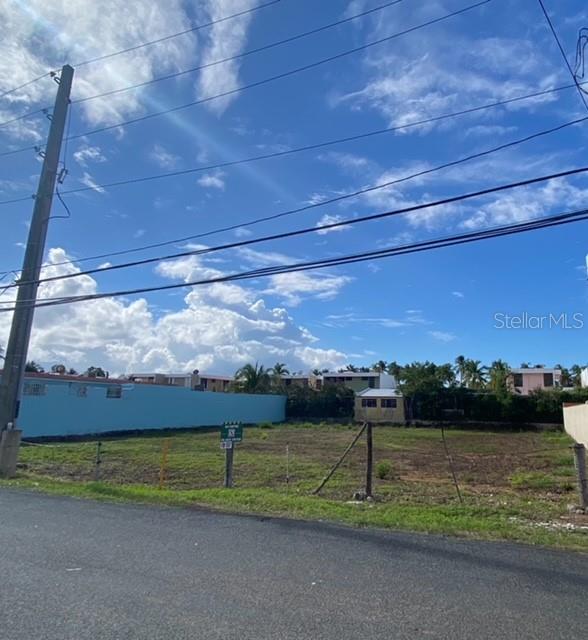 16 Ocean Drive Avenue, Unit LOTS A & B Luquillo, PR 00773 - Photo 10 of 15 a view of a road with an ocean beach