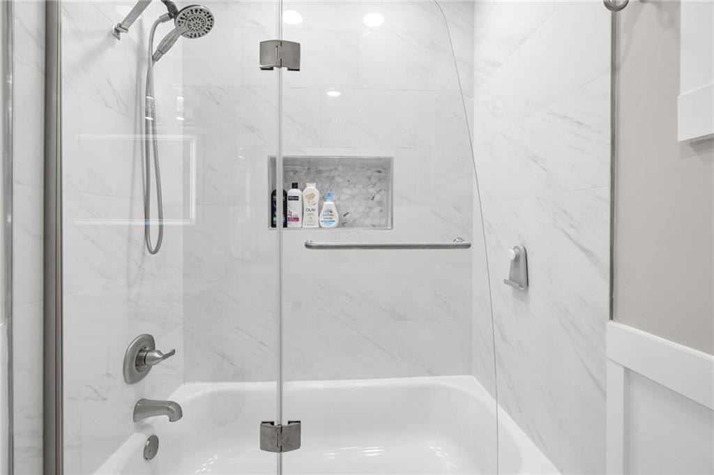 6470 Samoa Way Flowery Branch, GA 30542 - Photo 46 of 61 a bathroom with a shower