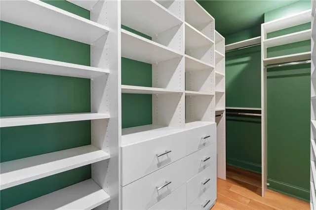 a bathroom with a tub and a shower