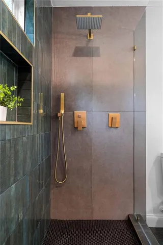 a bathroom with a bathtub and a shower curtain