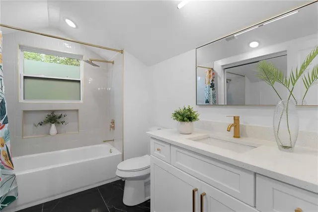 a view of backyard with a small cabin