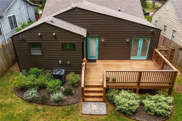 a view of a cafe with sitting area