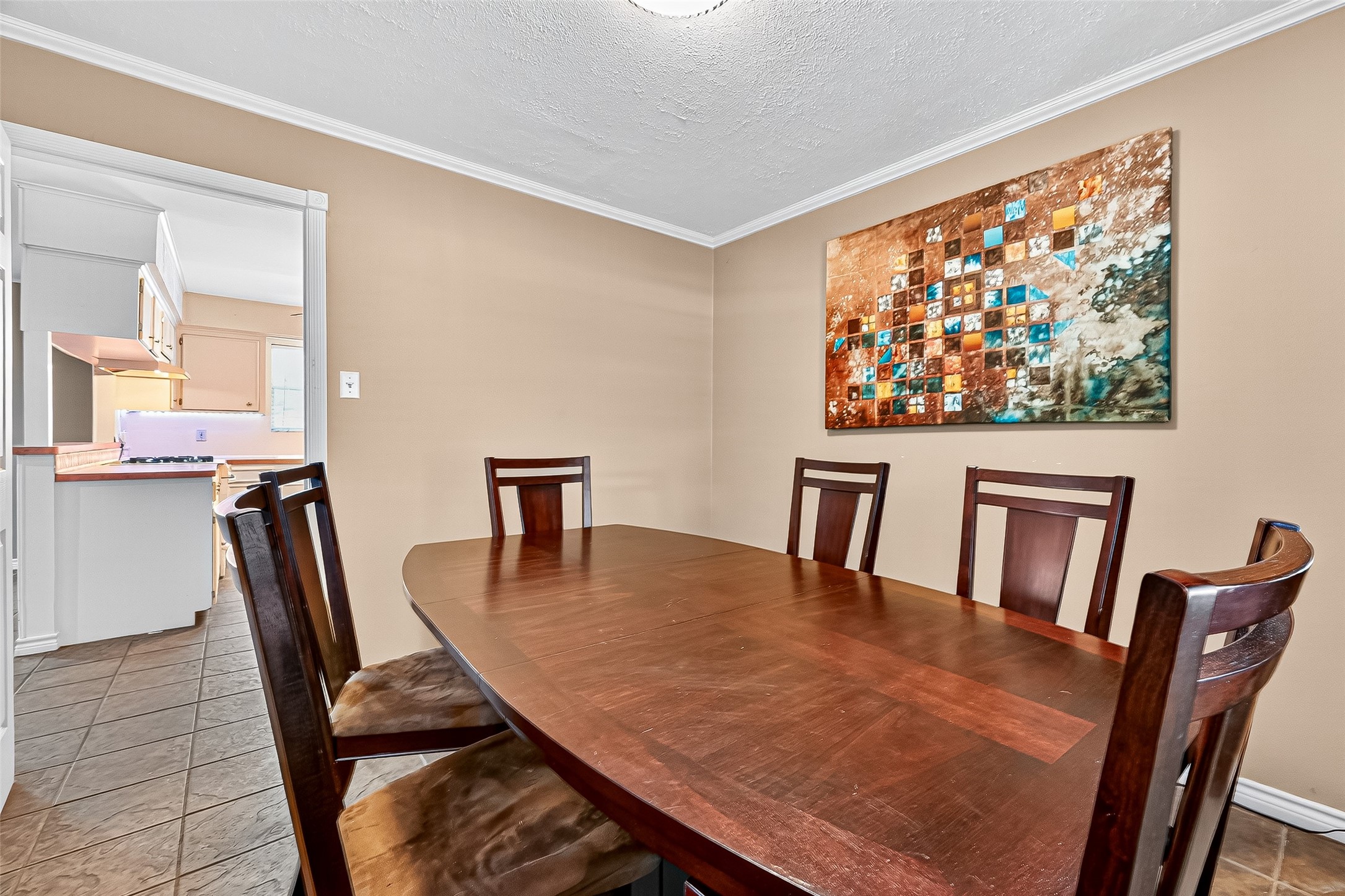 10302 Ivyridge Road Houston, TX 77043 - Photo 14 of 47 a dining room with furniture and wooden floor