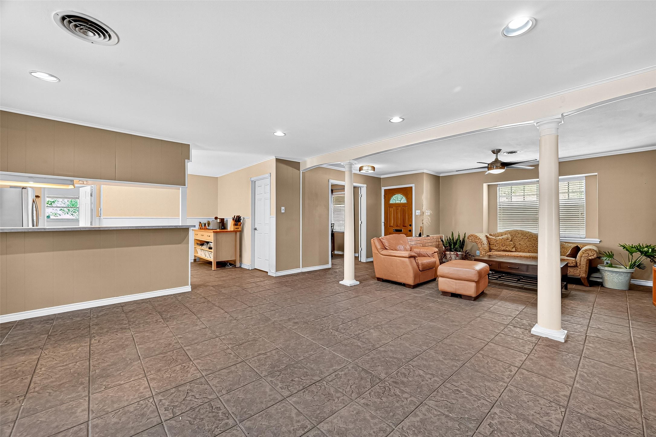 10302 Ivyridge Road Houston, TX 77043 - Photo 17 of 47 a view of a livingroom with furniture and a couch
