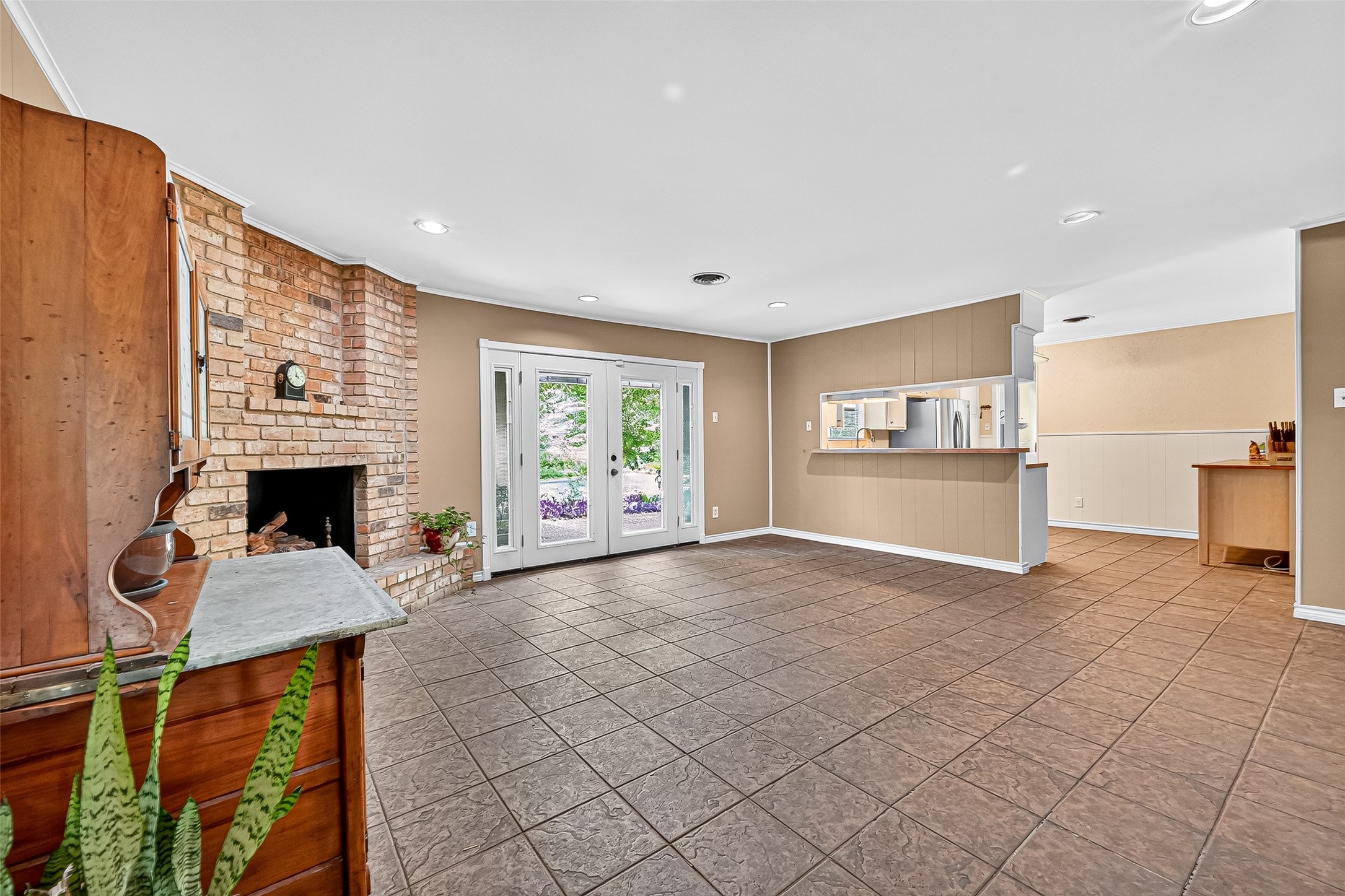 10302 Ivyridge Road Houston, TX 77043 - Photo 18 of 47 a view of a livingroom with furniture and a fireplace