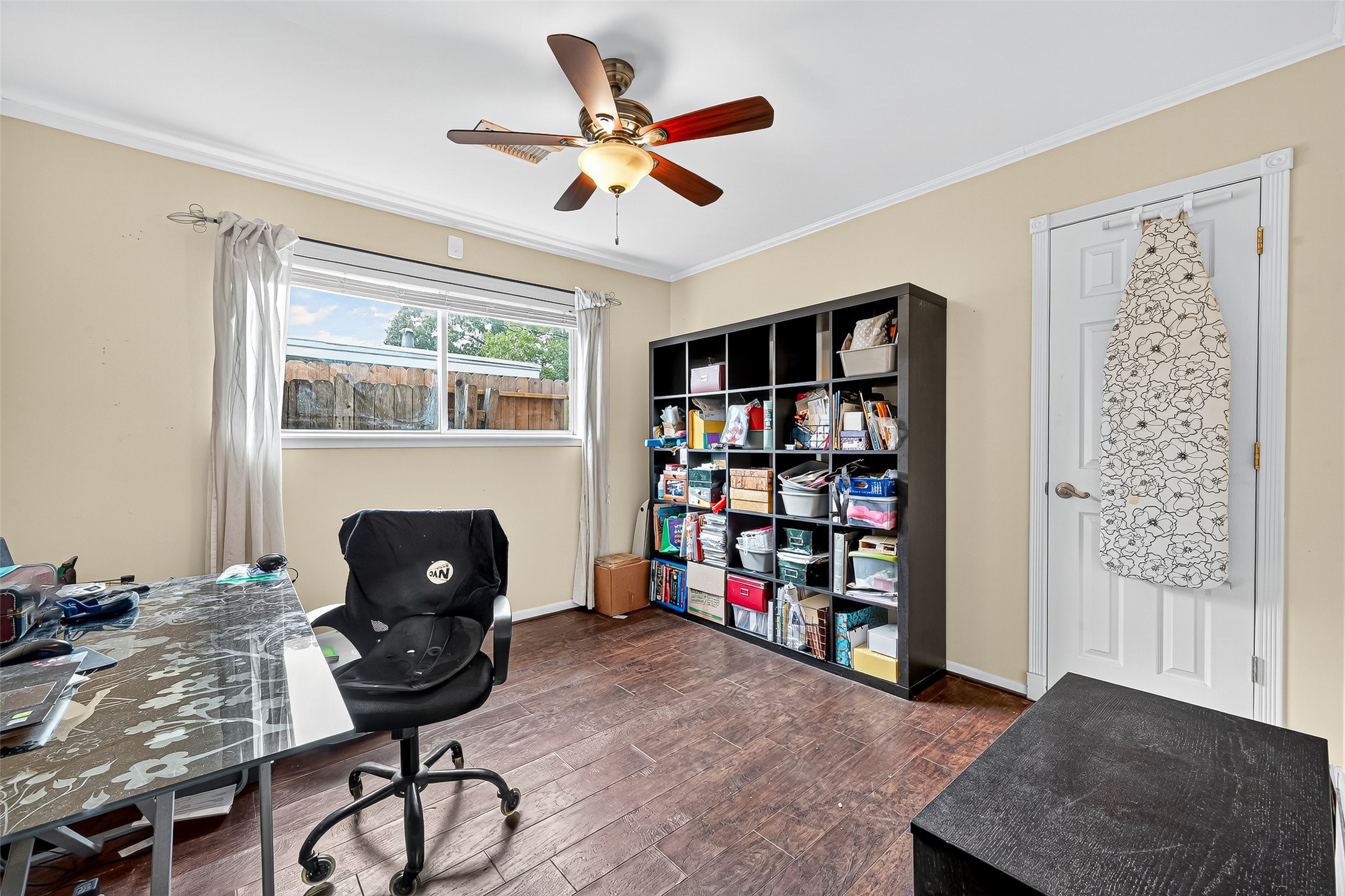 10302 Ivyridge Road Houston, TX 77043 - Photo 32 of 47 a living room with furniture a rug and a window