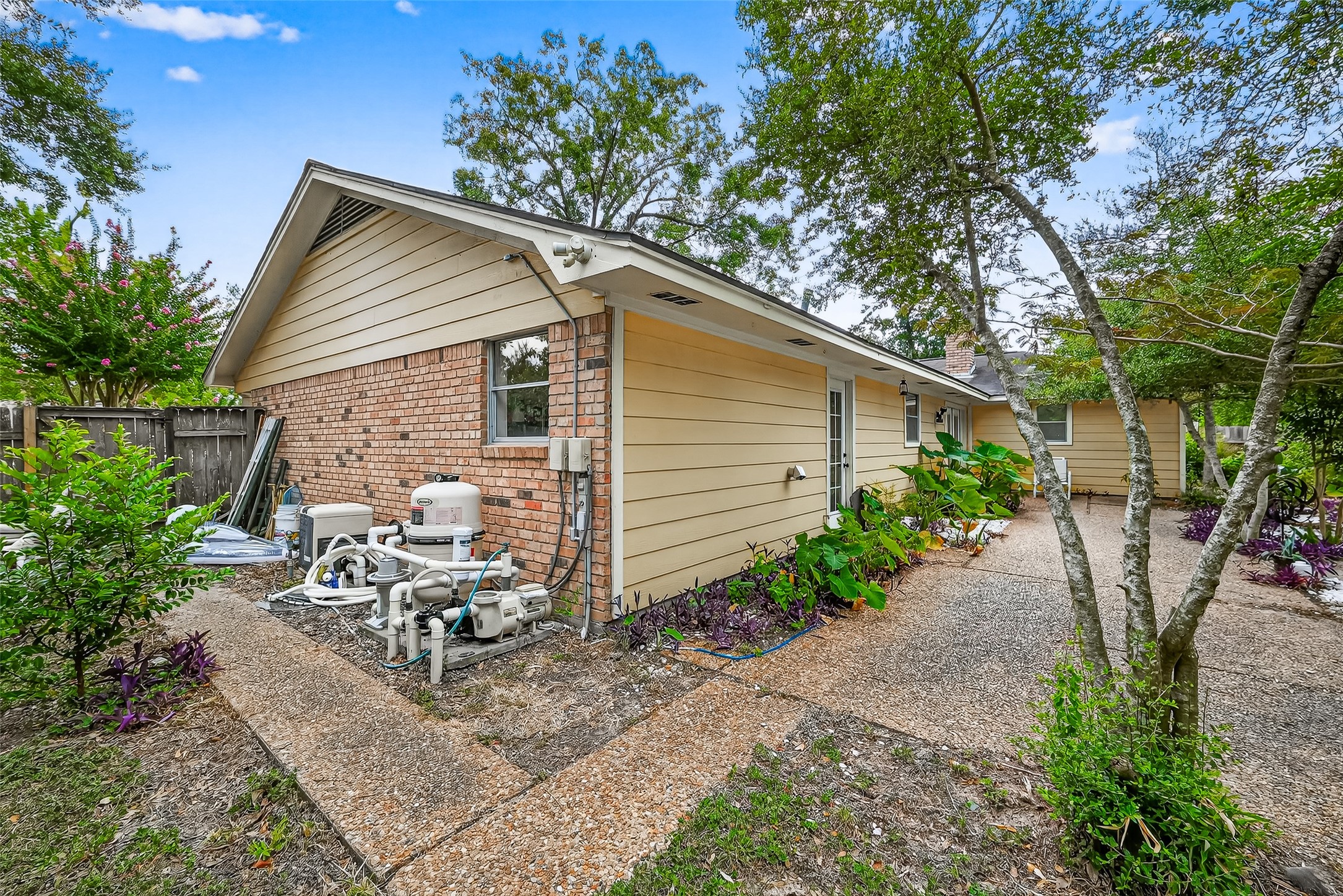 10302 Ivyridge Road Houston, TX 77043 - Photo 46 of 47 a view of backyard with outdoor seating and green space