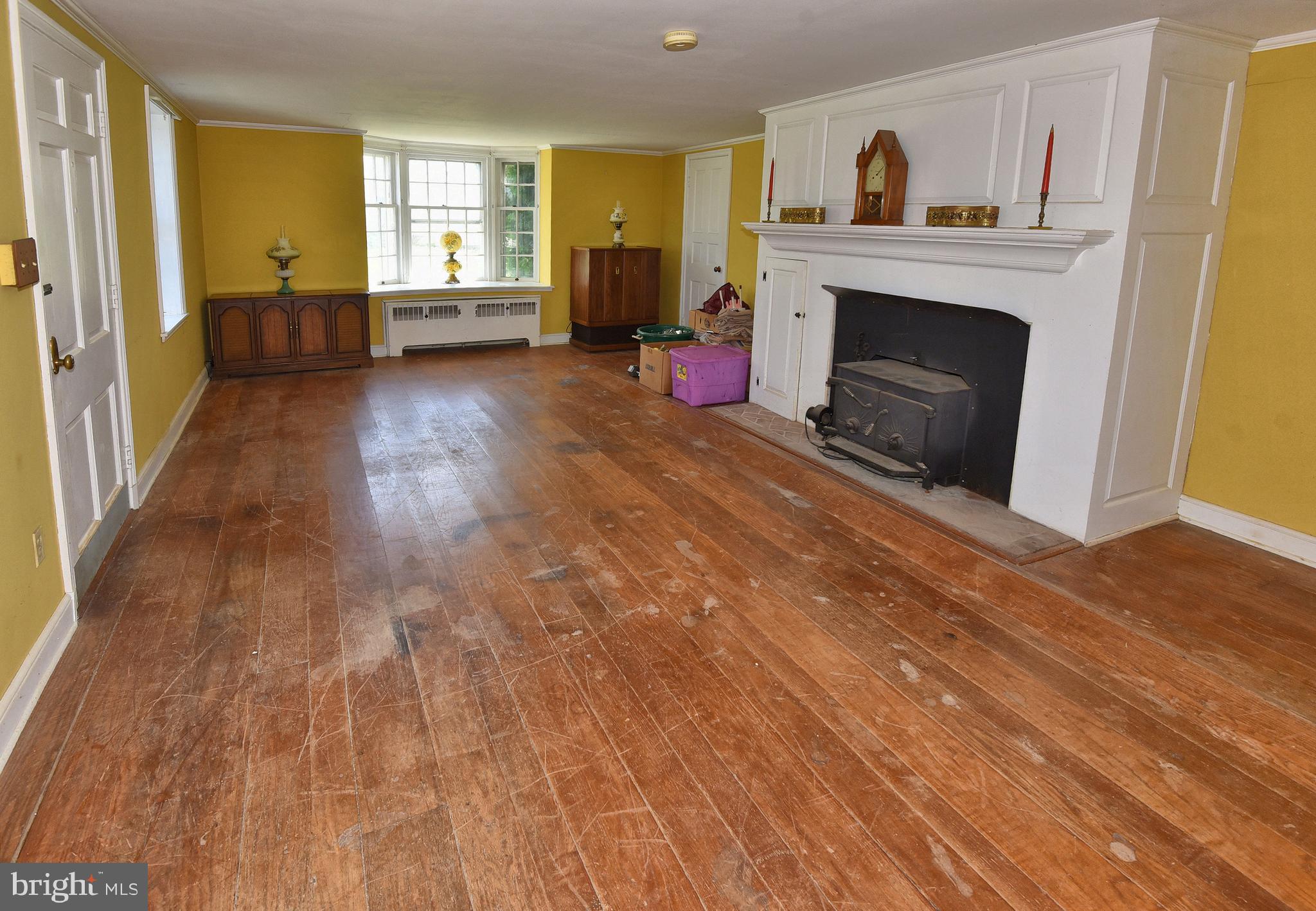 126 South Clear Ridge Road New Windsor, MD 21776 - Photo 3 of 34 Huge LR hdwds & wood stove FP for warmth & charm