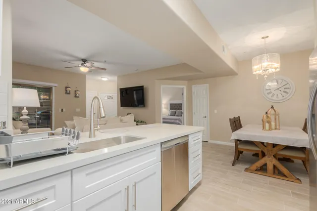 a bathroom with a sink double vanity and a mirror