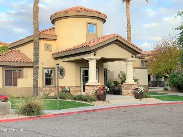 a front view of a house with a porch