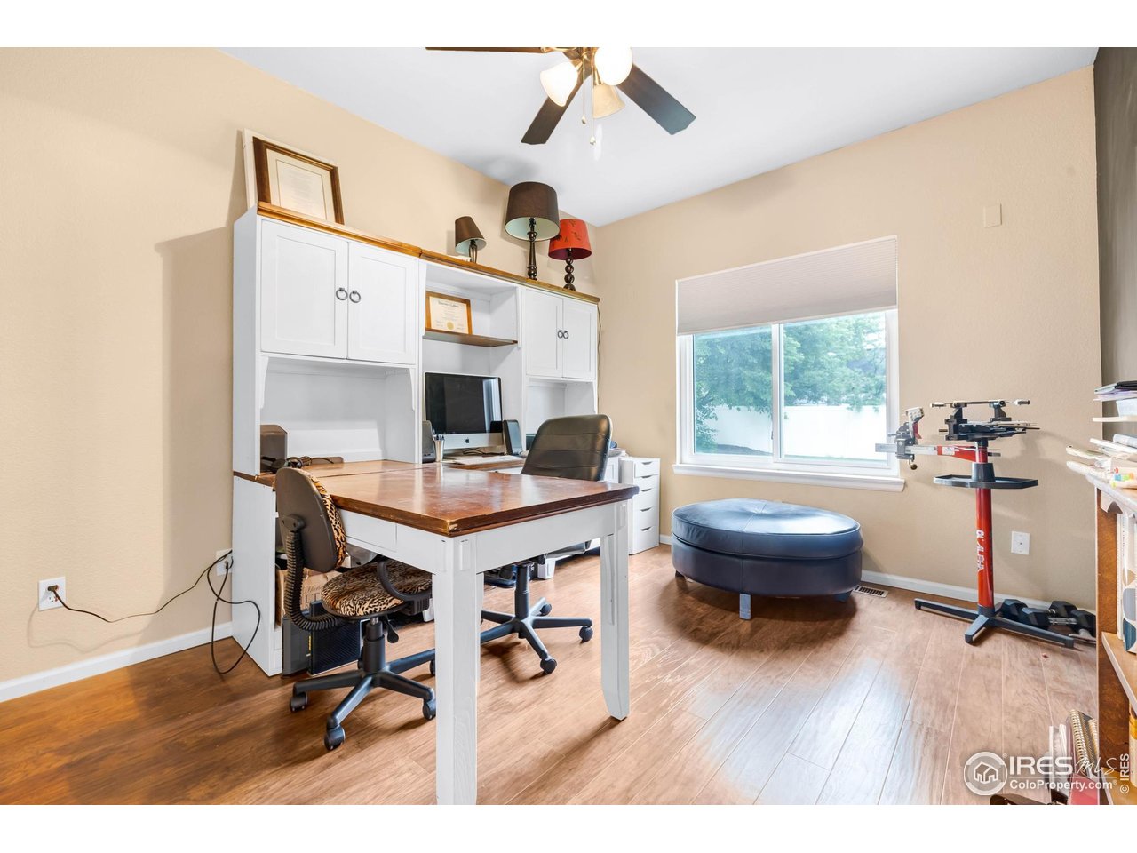 116 Cobble Court Windsor, CO 80550 - Photo 14 of 41 a workspace with furniture and a window