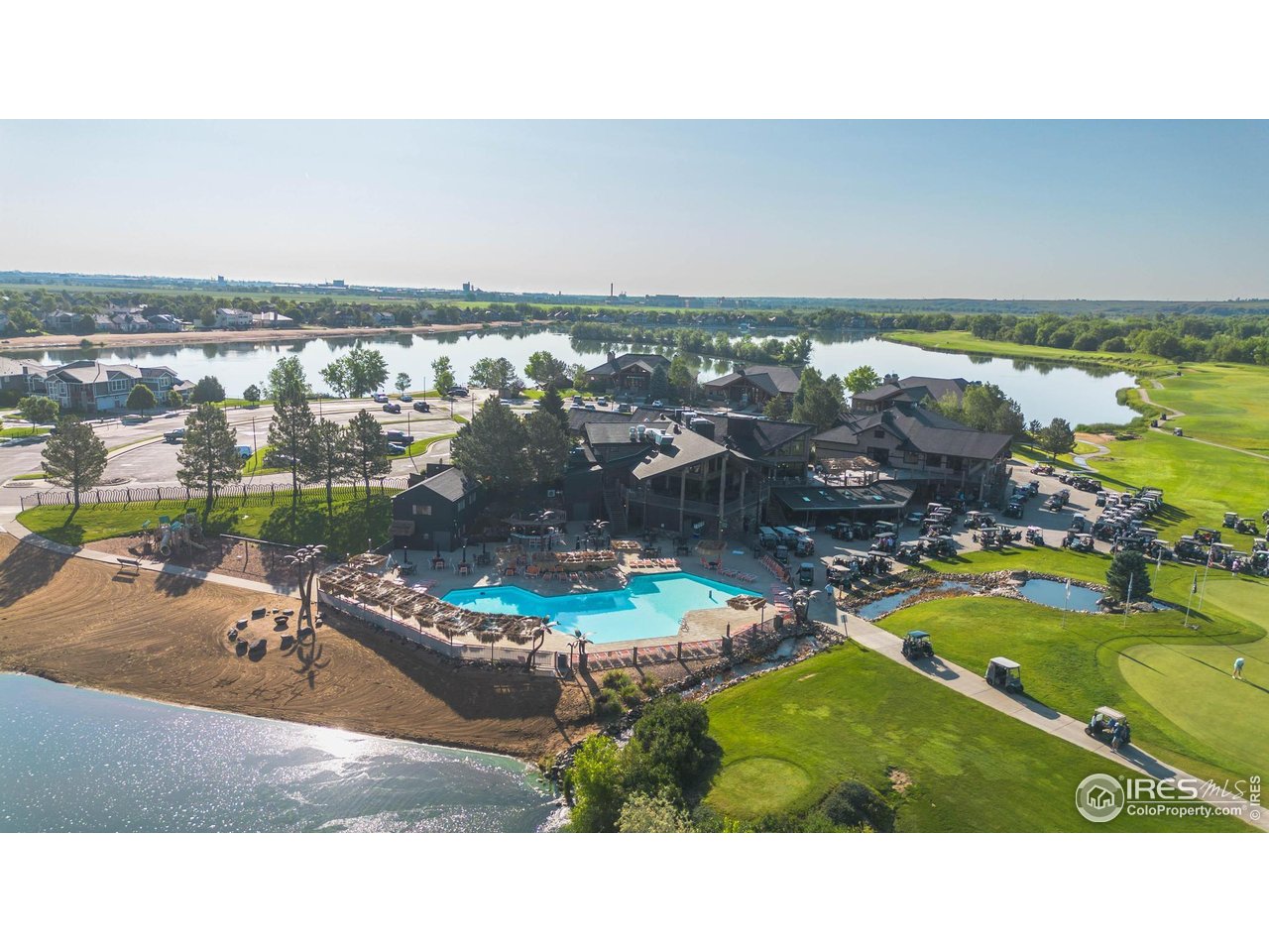 116 Cobble Court Windsor, CO 80550 - Photo 30 of 41 an aerial view of a house with a lake view