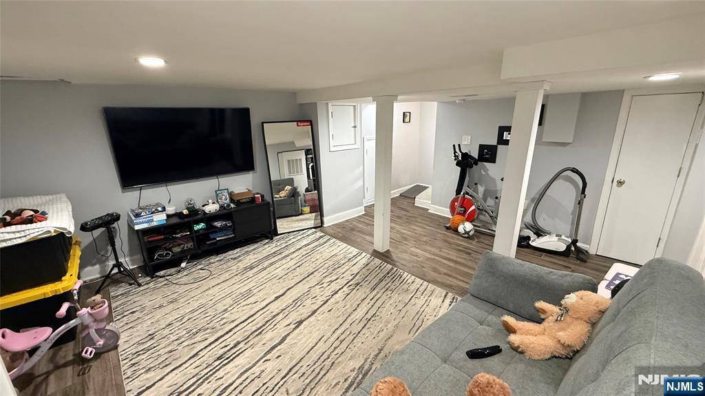 41 Stuyvesant Road Teaneck, NJ 07666 - Photo 19 of 21 a bed room with a bed and a flat screen tv