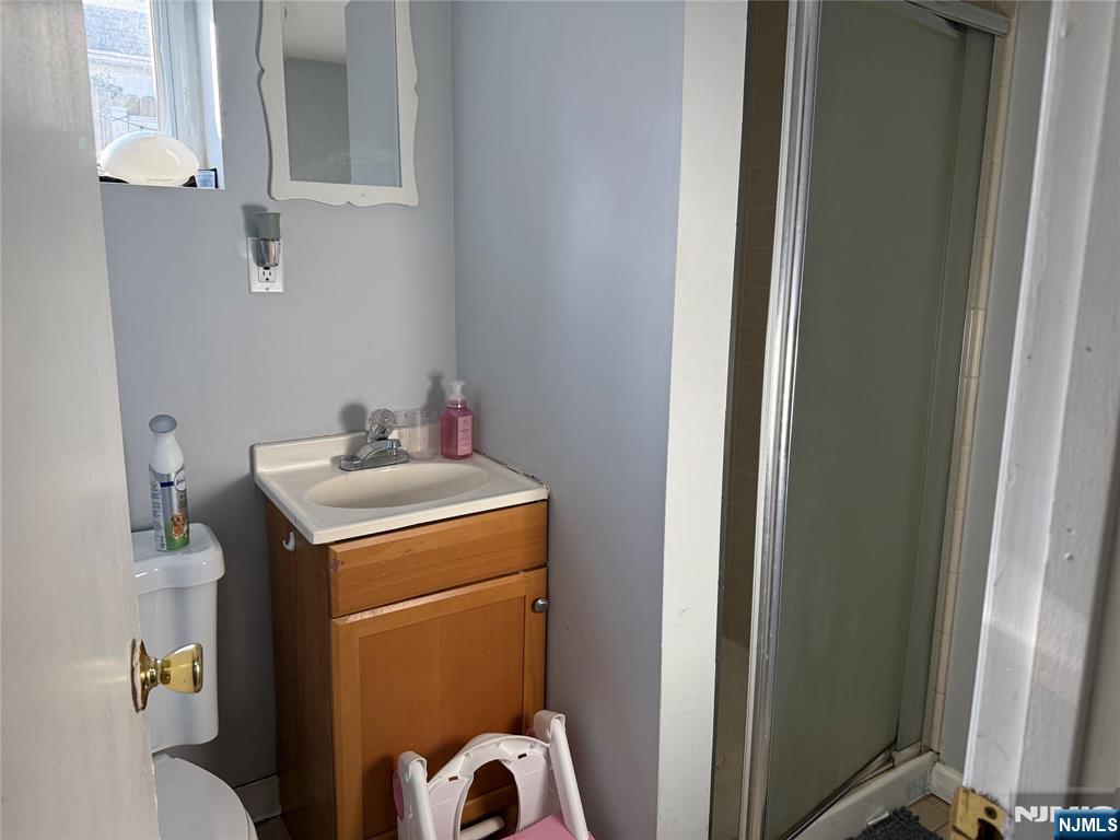 41 Stuyvesant Road Teaneck, NJ 07666 - Photo 21 of 21 a utility room with dryer and washer