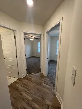 a view of a bathroom with a glass door shower
