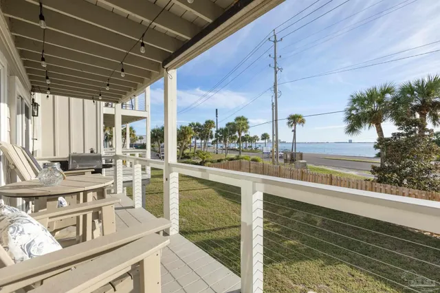 a view of a kitchen with living room