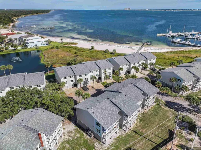 a view of a swimming pool with a yard