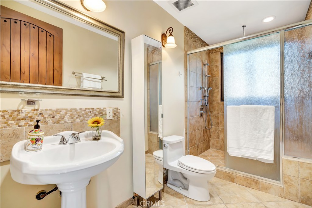 44 Hackamore Lane, Unit 46 Bell Canyon, CA 91307 - Photo 12 of 17 a bathroom with a sink toilet and shower