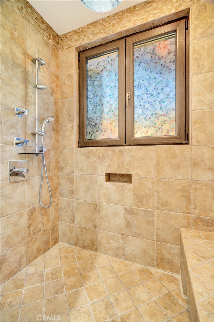 44 Hackamore Lane, Unit 46 Bell Canyon, CA 91307 - Photo 13 of 17 a bathroom with a shower