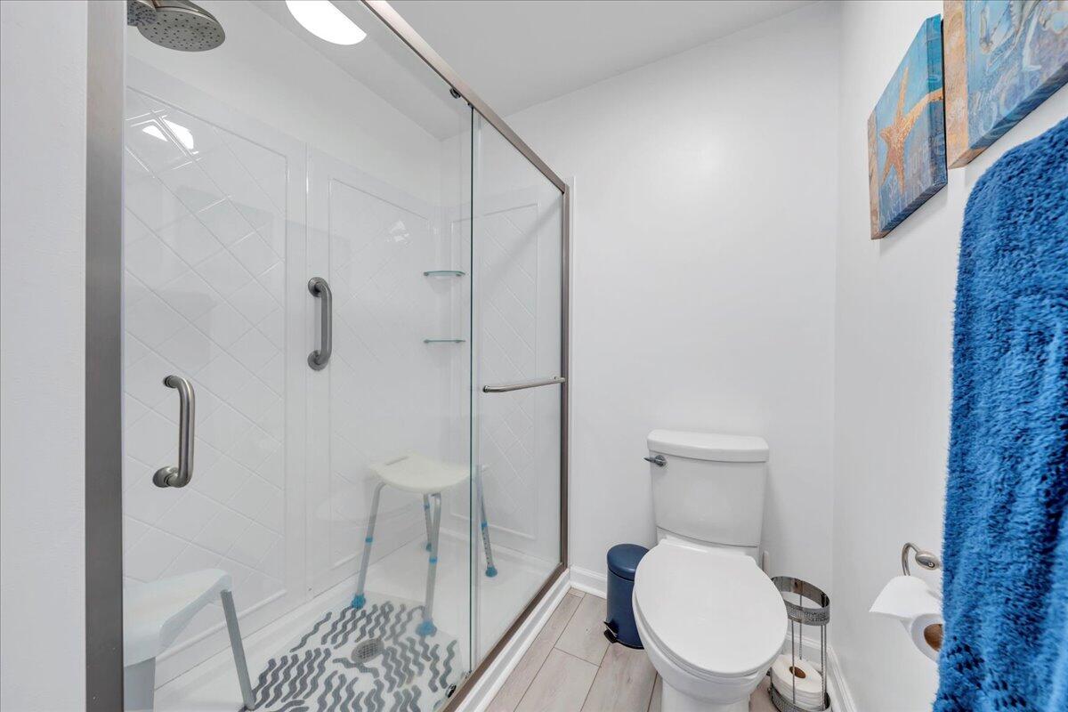 244 Cove Road Penhook, VA 24137 - Photo 50 of 88 a white toilet sitting next to a bathroom sink