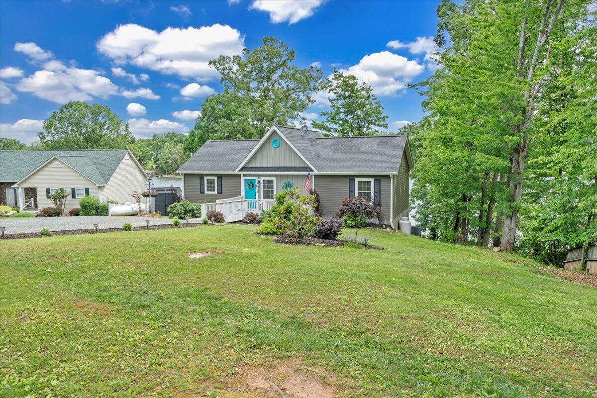 244 Cove Road Penhook, VA 24137 - Photo 66 of 88 a view of house with garden