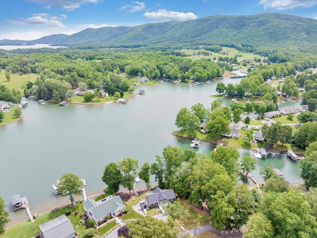 244 Cove Road Penhook, VA 24137 - Photo 85 of 88 a view of a lake with a mountain