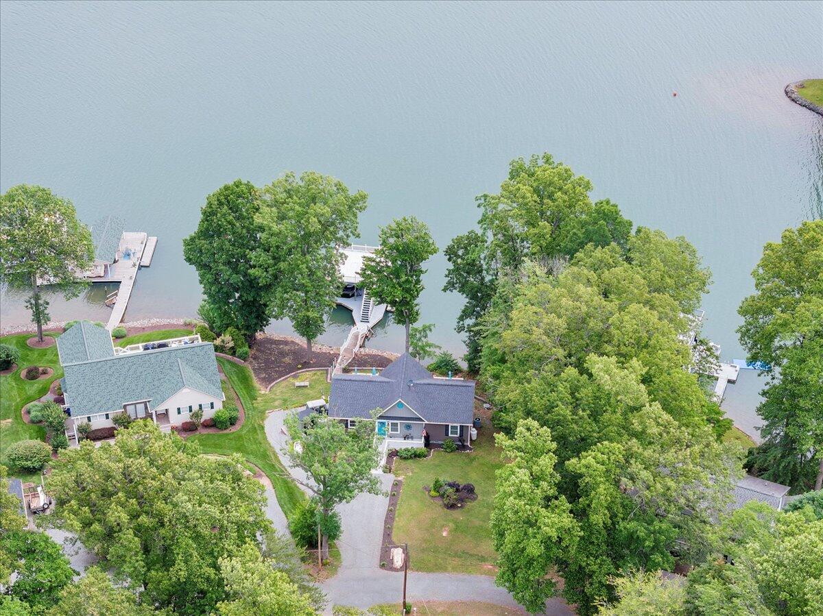 244 Cove Road Penhook, VA 24137 - Photo 86 of 88 an aerial view of residential house with outdoor space and trees all around