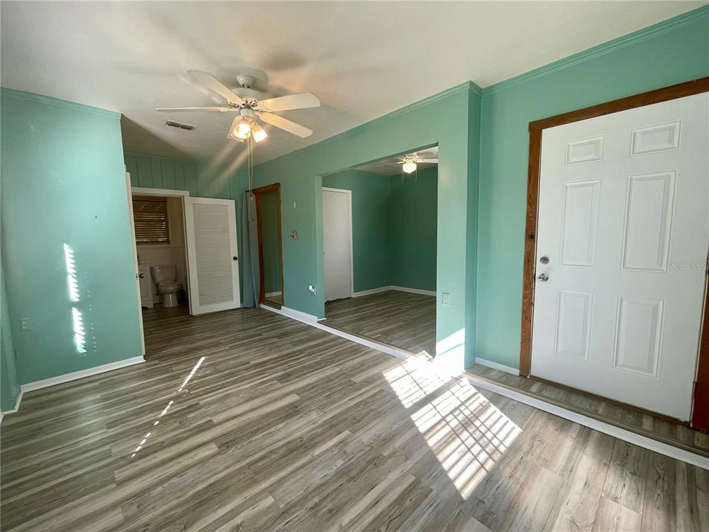 2043 Cordes Street Osprey, FL 34229 - Photo 18 of 35 a view of a room with wooden floor