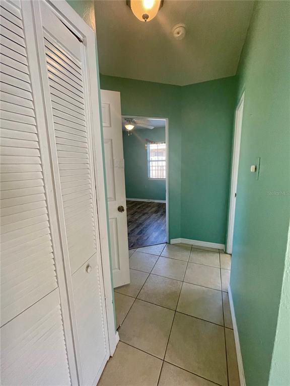 2043 Cordes Street Osprey, FL 34229 - Photo 20 of 35 a bathroom with a glass door shower