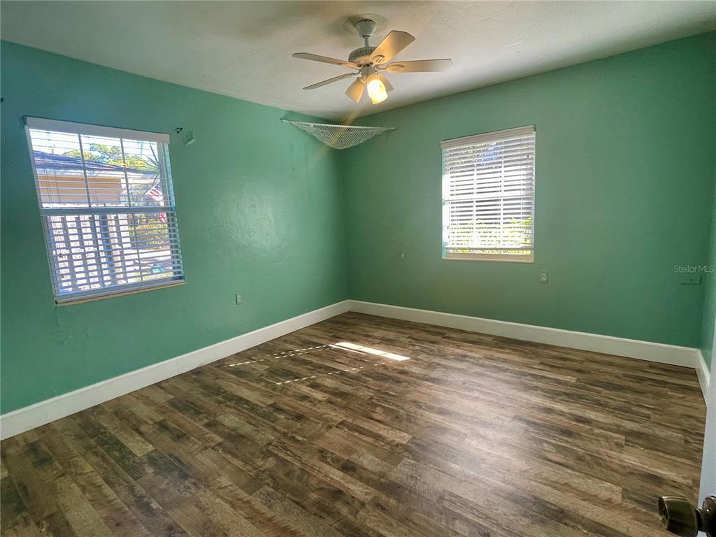 2043 Cordes Street Osprey, FL 34229 - Photo 21 of 35 a view of empty room with window and ceiling fan
