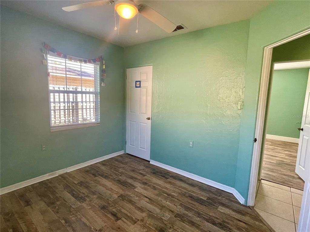 2043 Cordes Street Osprey, FL 34229 - Photo 25 of 35 an empty room with closet and window