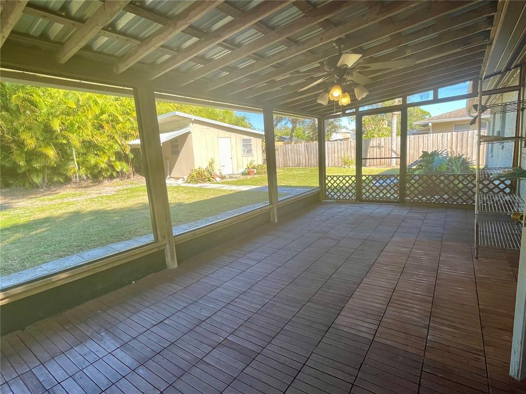 2043 Cordes Street Osprey, FL 34229 - Photo 28 of 35 a view of an empty room with a large window
