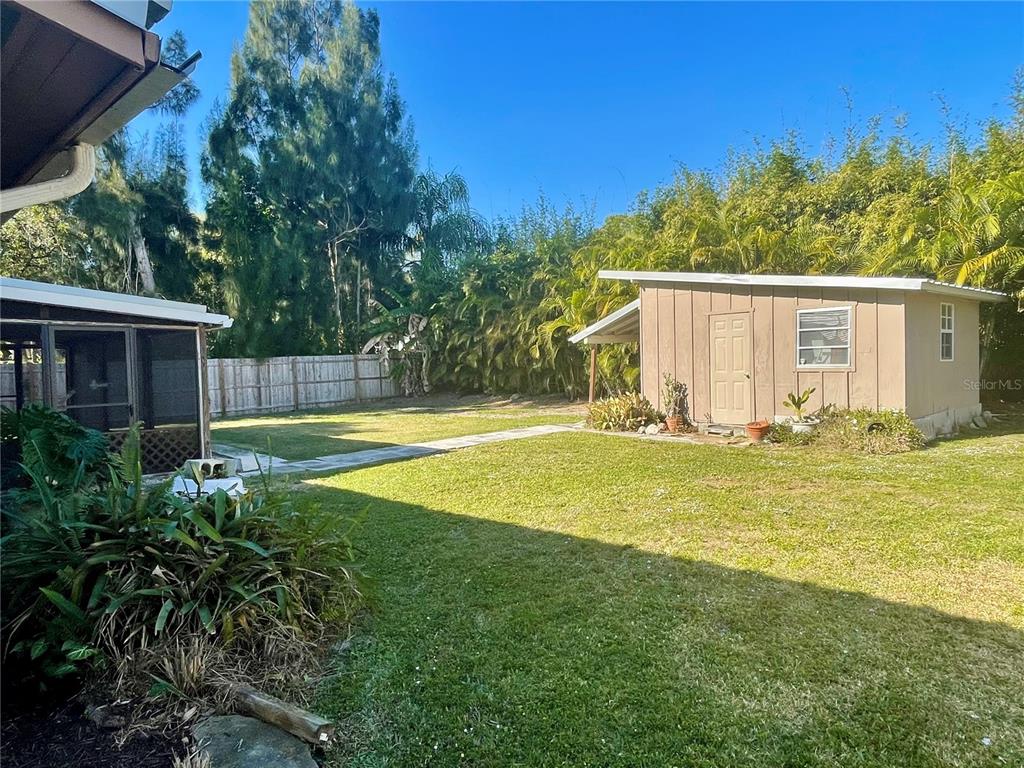 2043 Cordes Street Osprey, FL 34229 - Photo 34 of 35 a view of a house with a swimming pool
