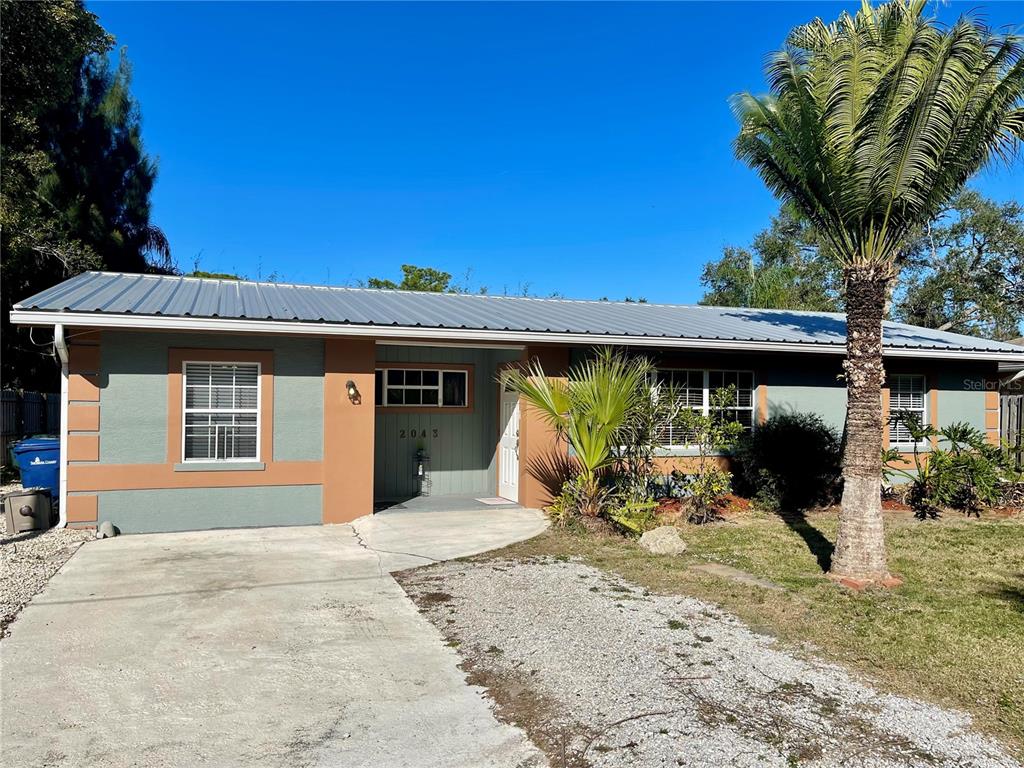 2043 Cordes Street Osprey, FL 34229 - Photo 4 of 35 a view of a house with a patio