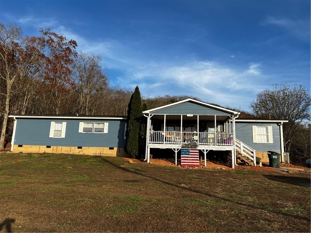 330 Cagle Road Southeast Fairmount, GA 30139 - Photo 1 of 1 a front view of a house with a yard