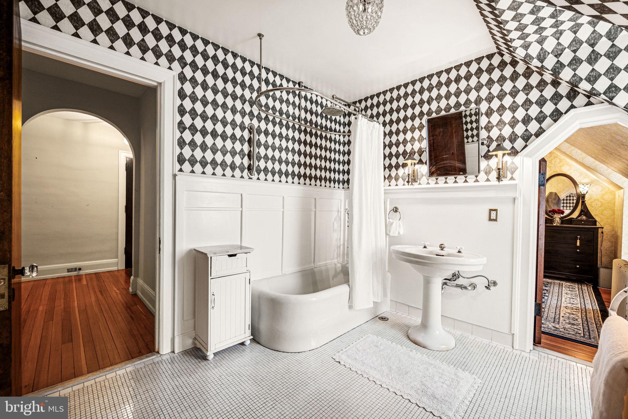 1018 Beech Road Wallingford, PA 19086 - Photo 41 of 66 a bathroom with a bathtub and a shower