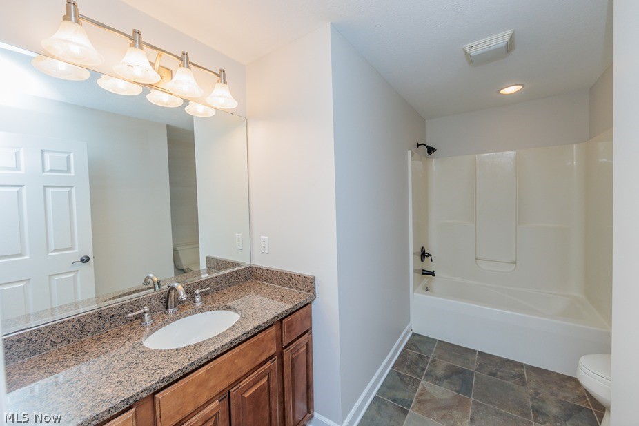 6947 Som Center Road Solon, OH 44139 - Photo 46 of 50 Full bathroom with vanity, toilet, tub / shower combination, and tile flooring