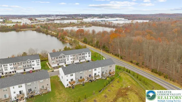 a view of a city from a lake view