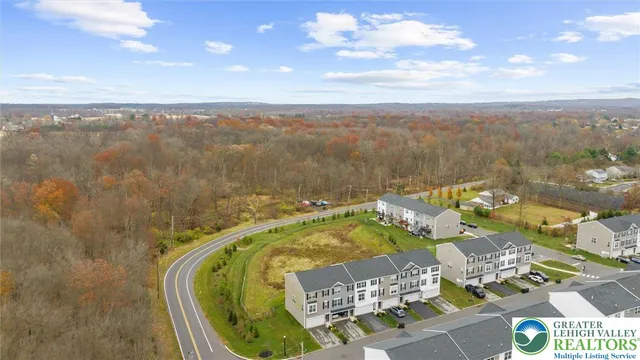 a view of a swimming pool with a balcony