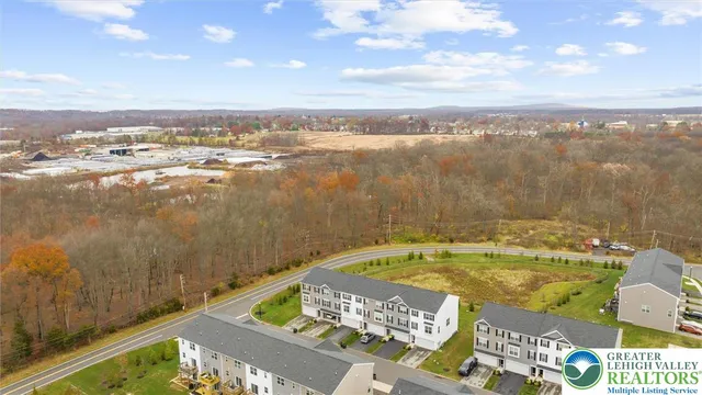 a view of a city with an ocean