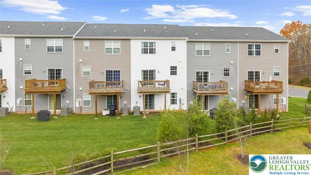 a view of a house with a swimming pool
