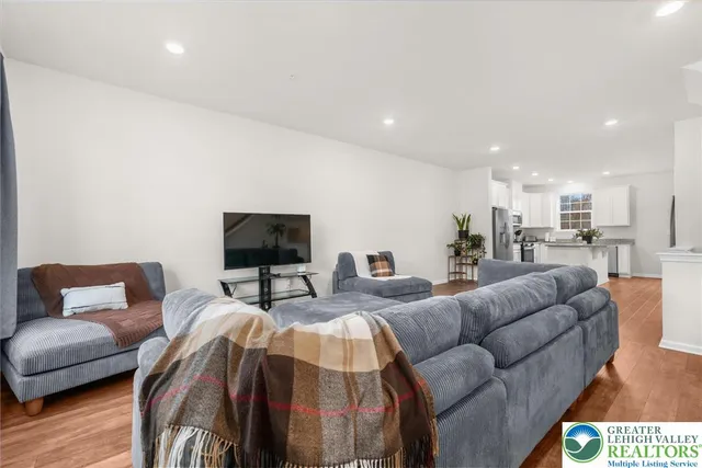 a living room with furniture and a couch